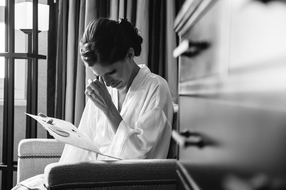 bride crying while reading letter