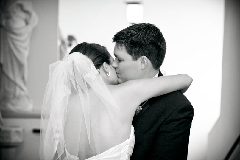 groom kissing bride