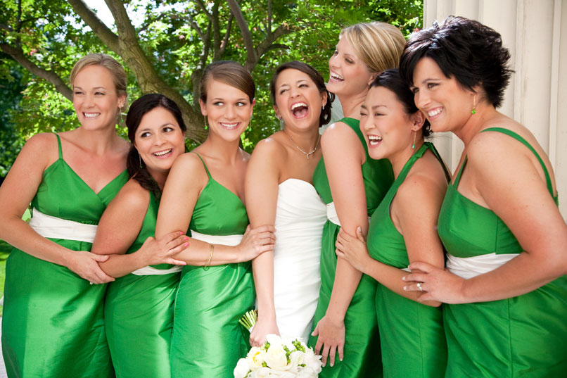 bride with bridesmaids with green dresses