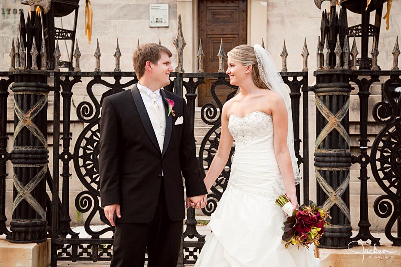 bride and groom in front of the washington monument