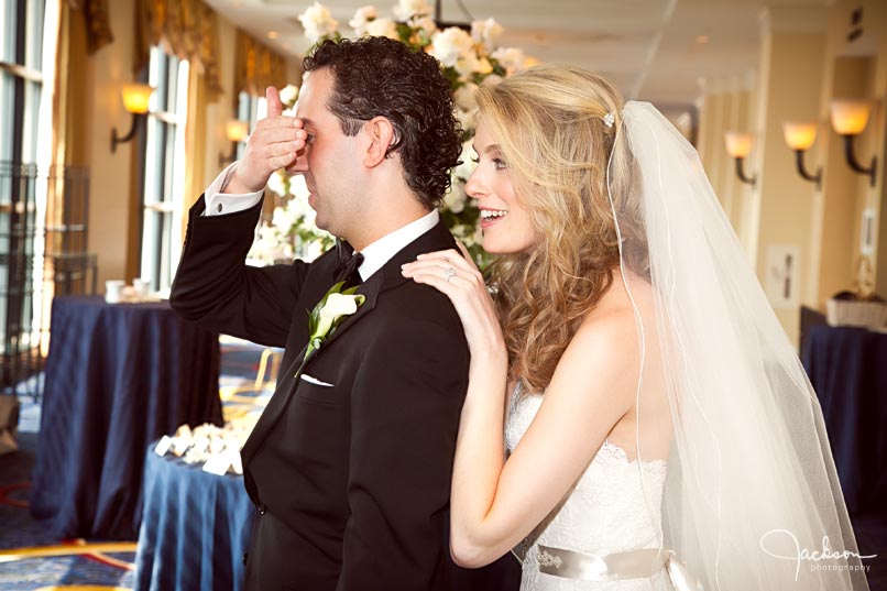 bride sneaking up on groom