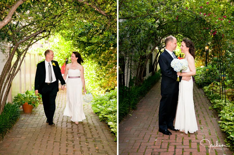 bride and groom walking along the path of chase court