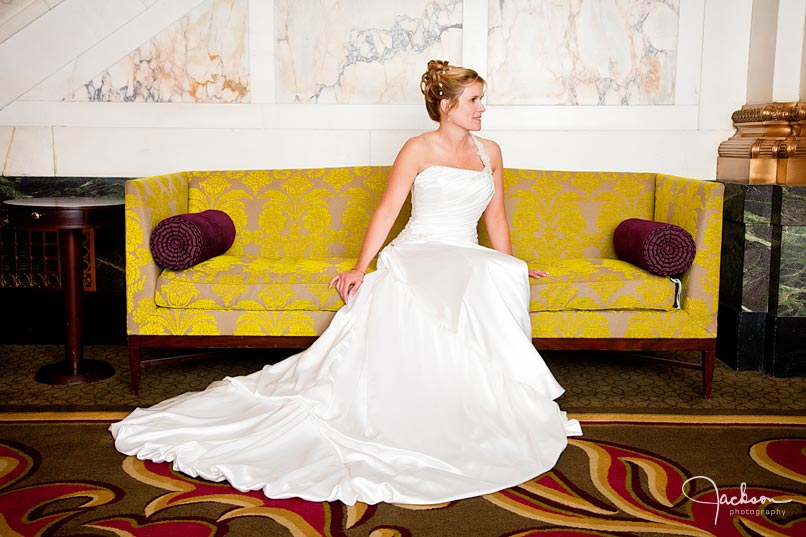 bride on antique yellow couch