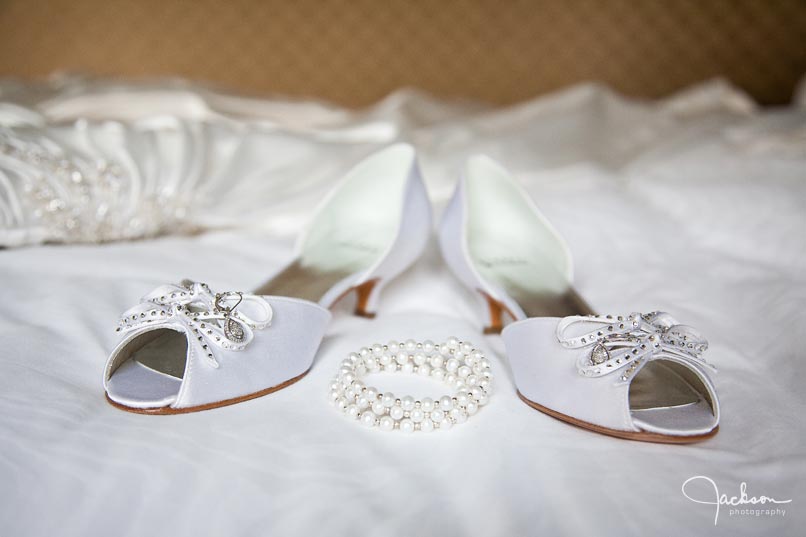 bride shoes and pearl bracelet