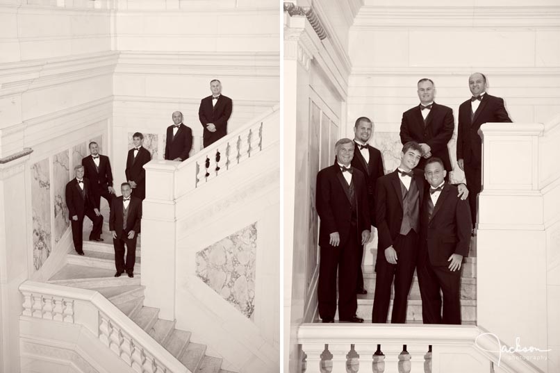 groom and groomsmen on marble staircase
