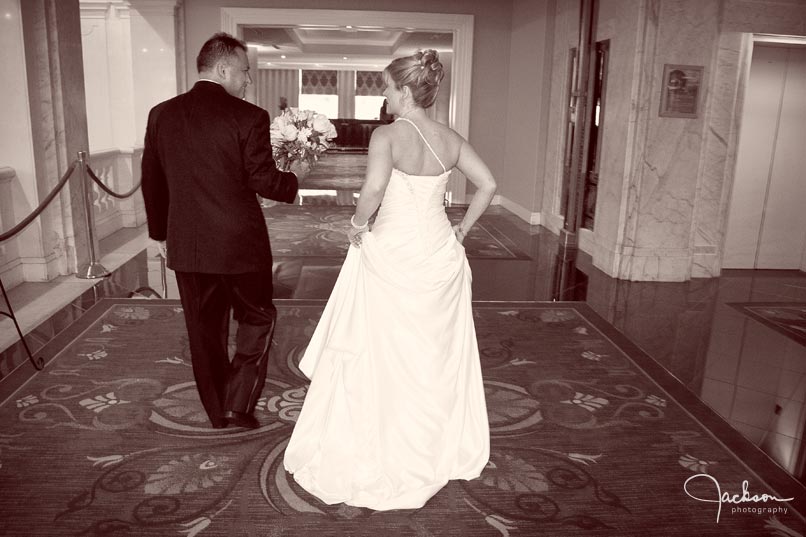 bride and groom exiting reception