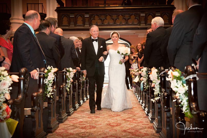 bride and father walking down the aisle