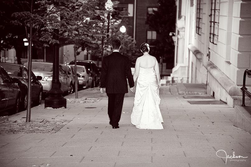 bride and groom walking at night