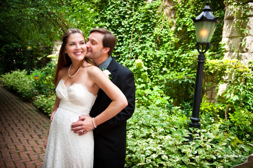 bride and groom by lamppost 