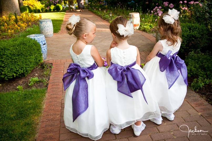 flower girls with purple sash