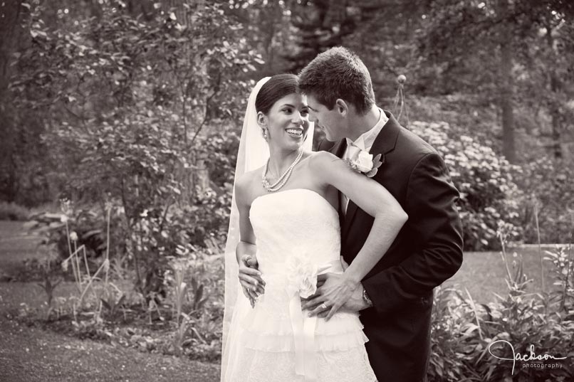 bride and groom posing