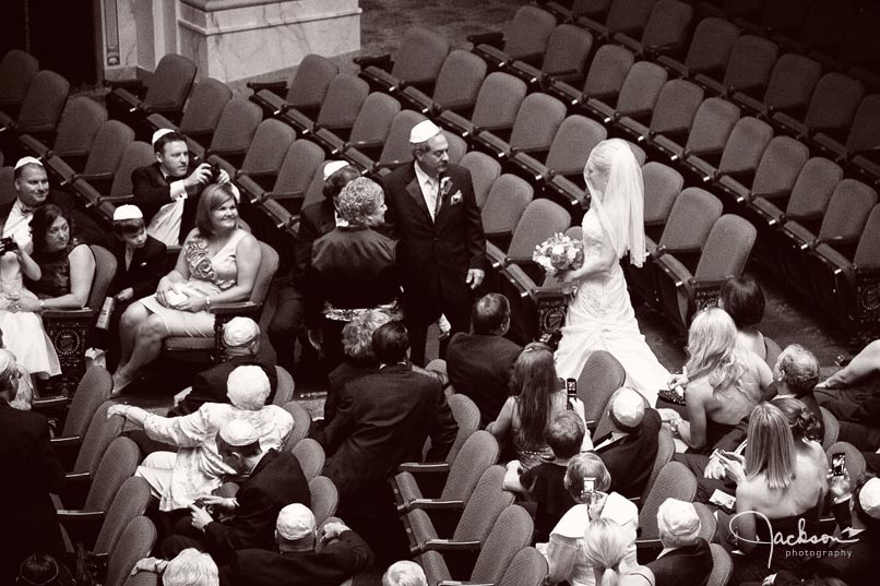 bride walking down theater aisle