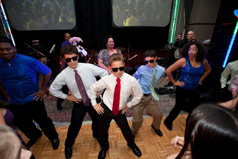 boys dancing at mitzvah party