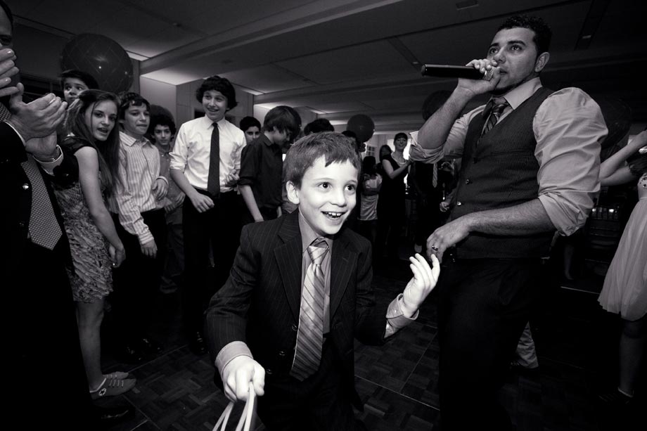 brother entering mitzvah party