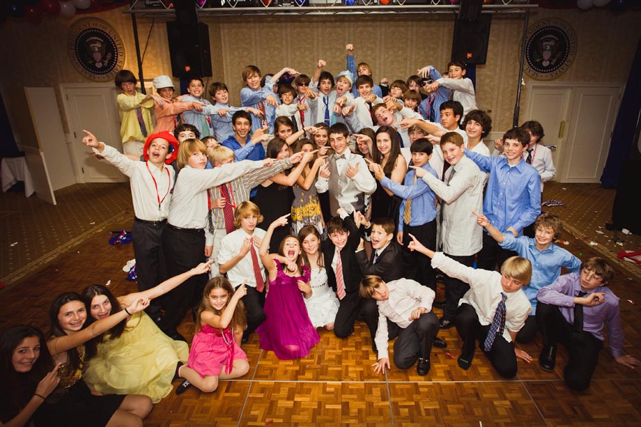 mitzvah party friends posing and pointing