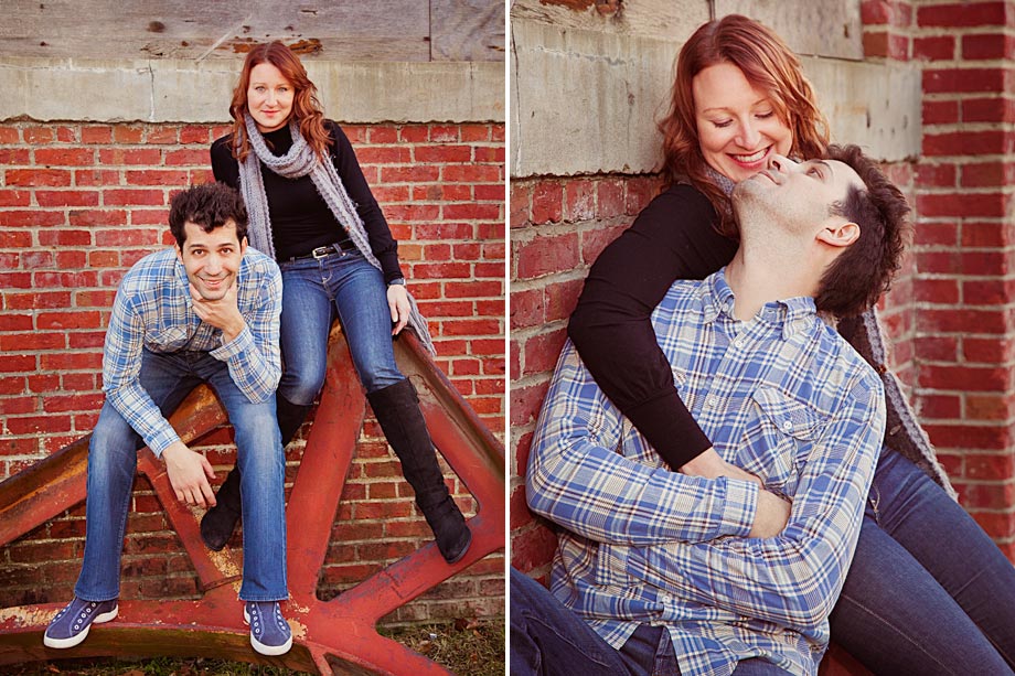 couple posing on red iron sculpture