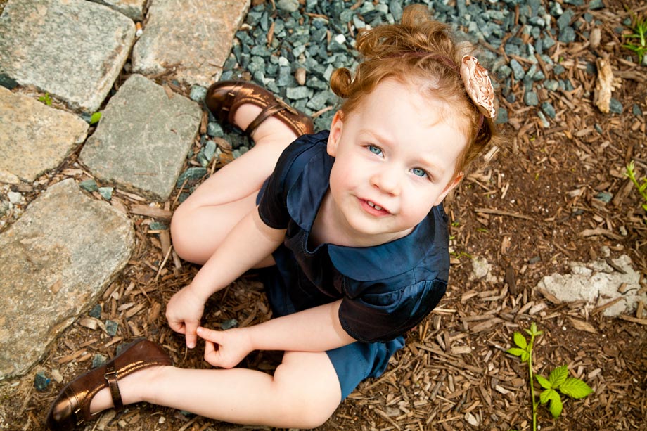 child with red hair and blue eyes