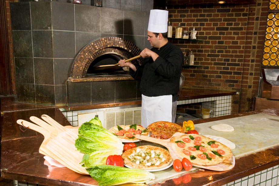 chef cooking pizza