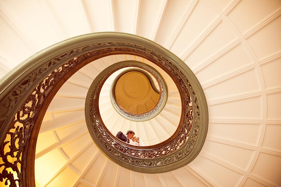 bride and groom on peabody staircase