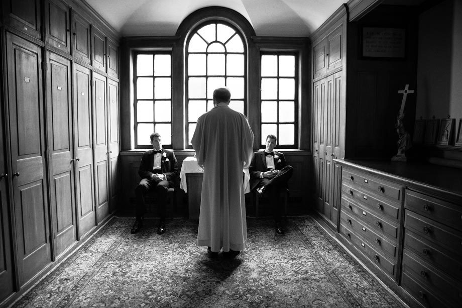 groom in church window light