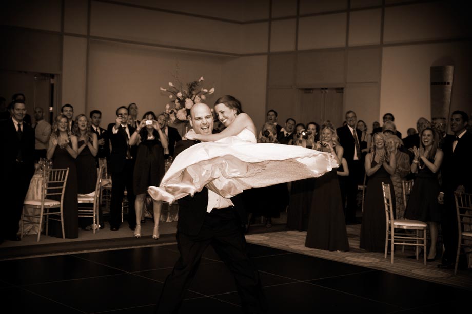 bride and groom entering hyatt reception