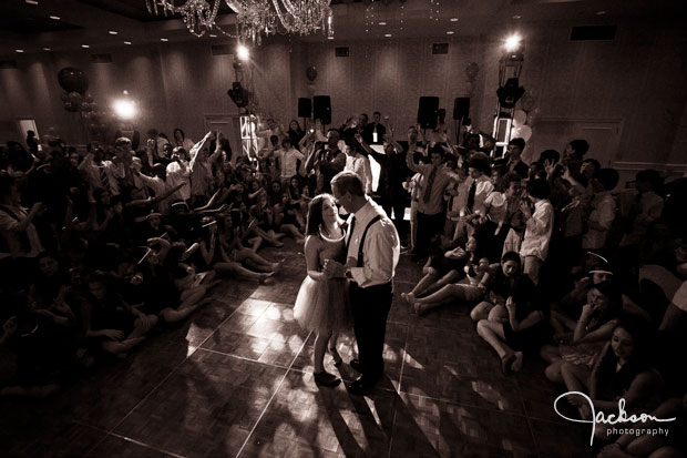 daughter dancing with father at party