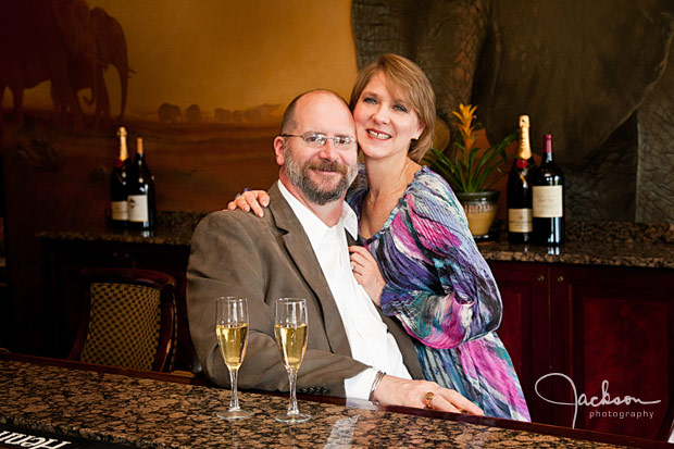 couple sitting with glasses of champagne