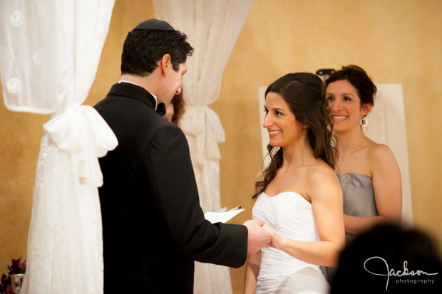 groom reading vows to bride