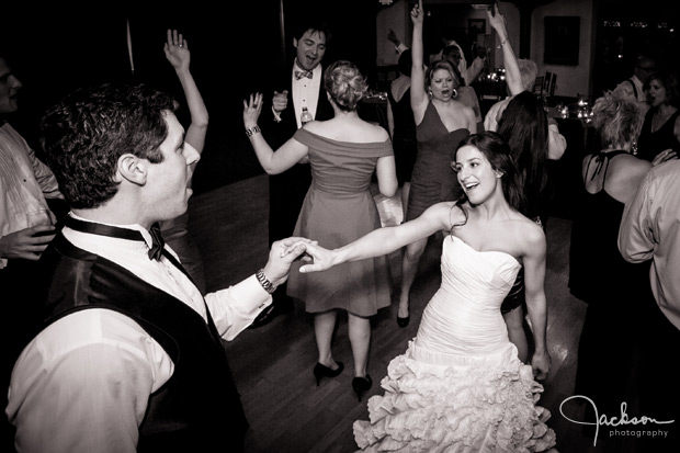 bride and groom getting down dancing