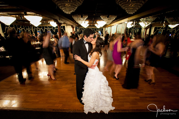 bride and groom kissing on the dancefloor