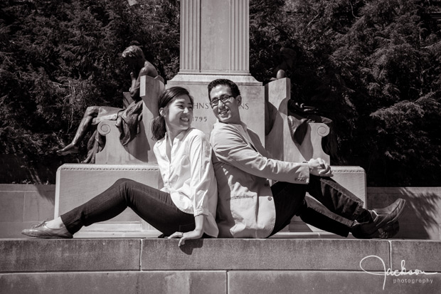 couple sitting on ledge