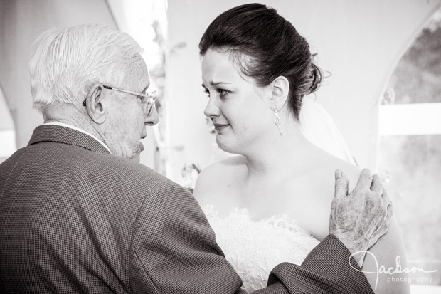 bride crying with grandfather