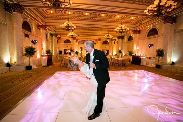 bride and groom dipping on dancefloor