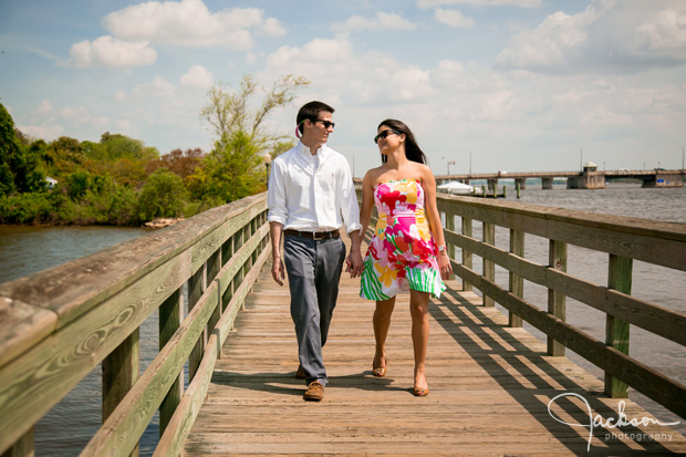 couple walking on pier