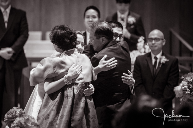 hugging the parents during ceremony