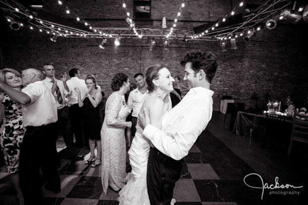 bride and groom dancing black and white