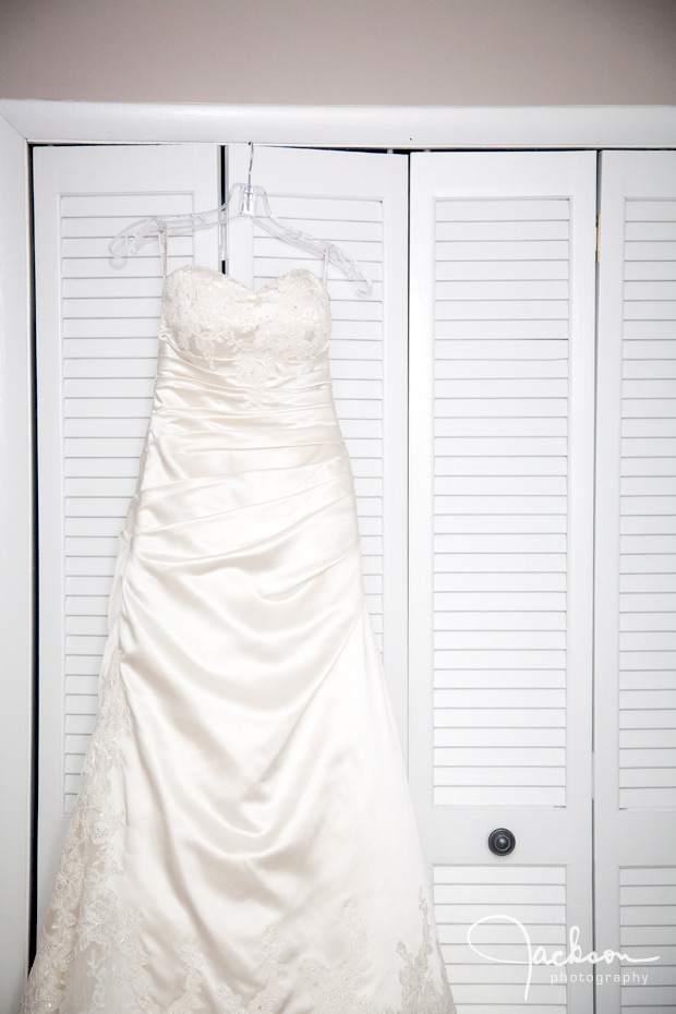 bride's gown hanging on closet