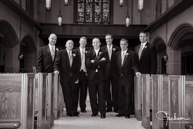 groomsmen in the aisles of loyola chapel