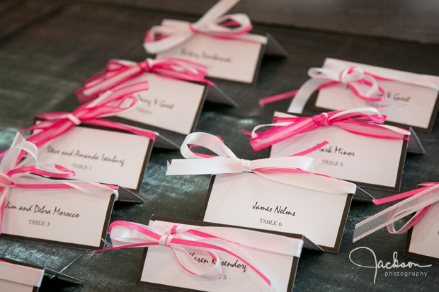 pink and white ribbon namecards