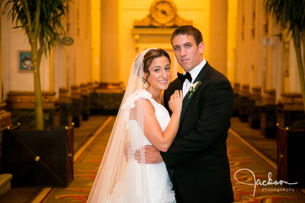 bride and groom in lobby of hotel monaco