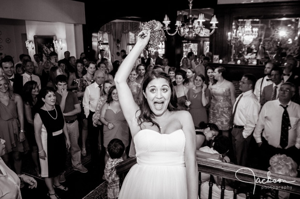 bride throwing bouquet