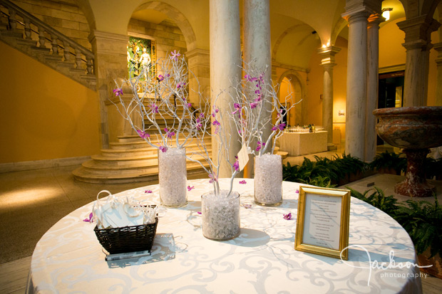 white tree with purple flowers sign in table