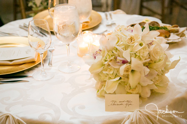 brides yellow and white bouquet on bridal table