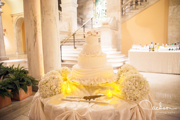 white wedding cake with orchids