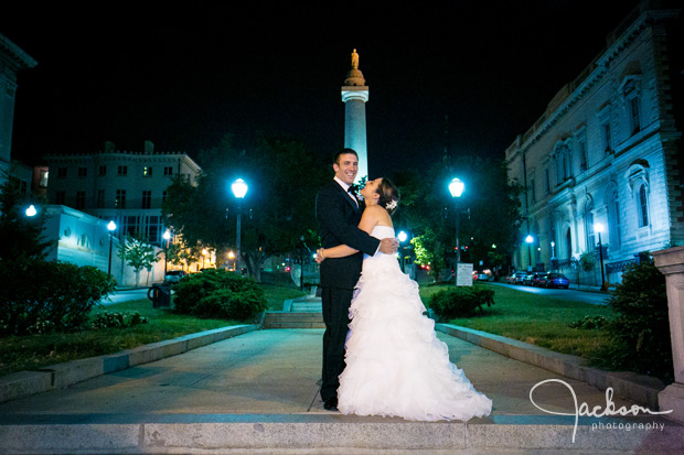 bride and groom at night in mount vernon square