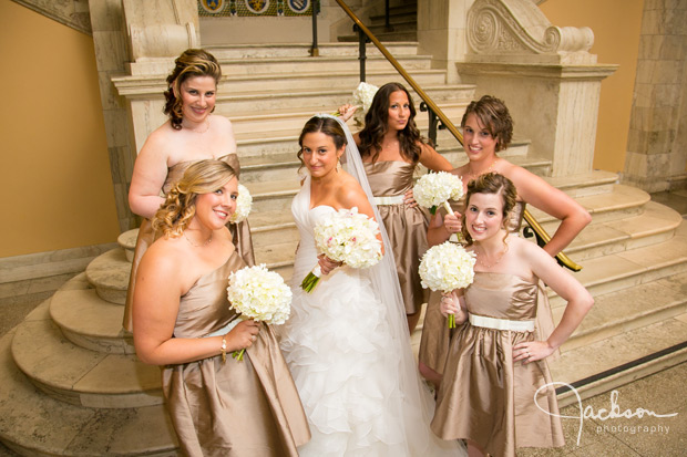 bride with bridesmaids in gold and white