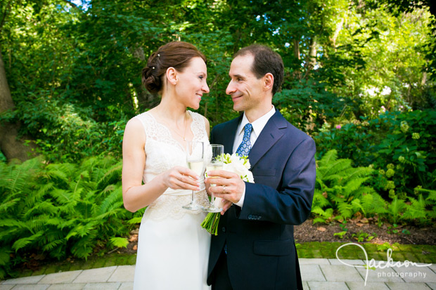 bride and groom toasting