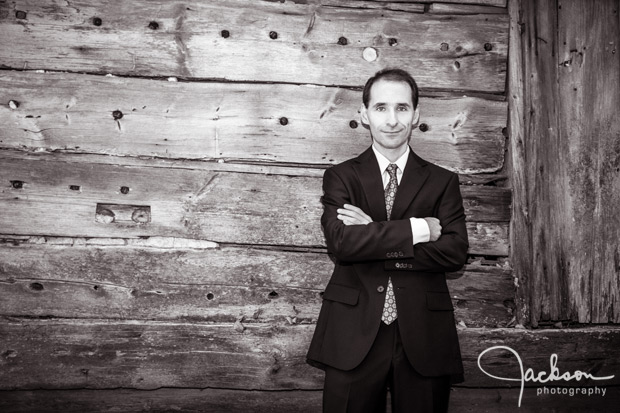 groom with wood texture behind