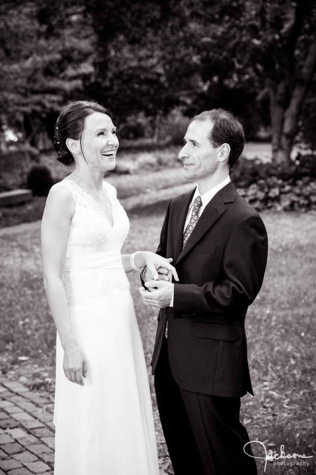 bride and groom laughing