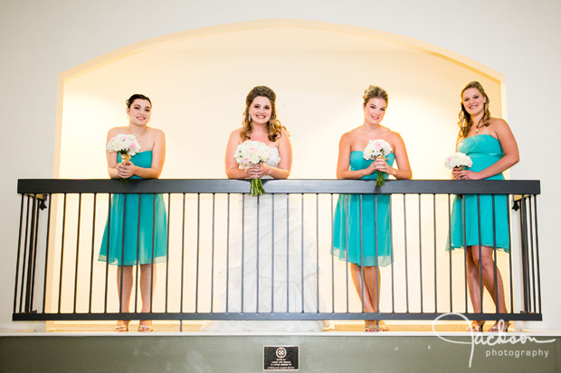 bride and bridesmaids in teal blue dresses